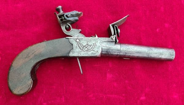 An Irish flintlock pocket pistol by J Dobson Dublin. Circa 1796-1803. Ref 7387.